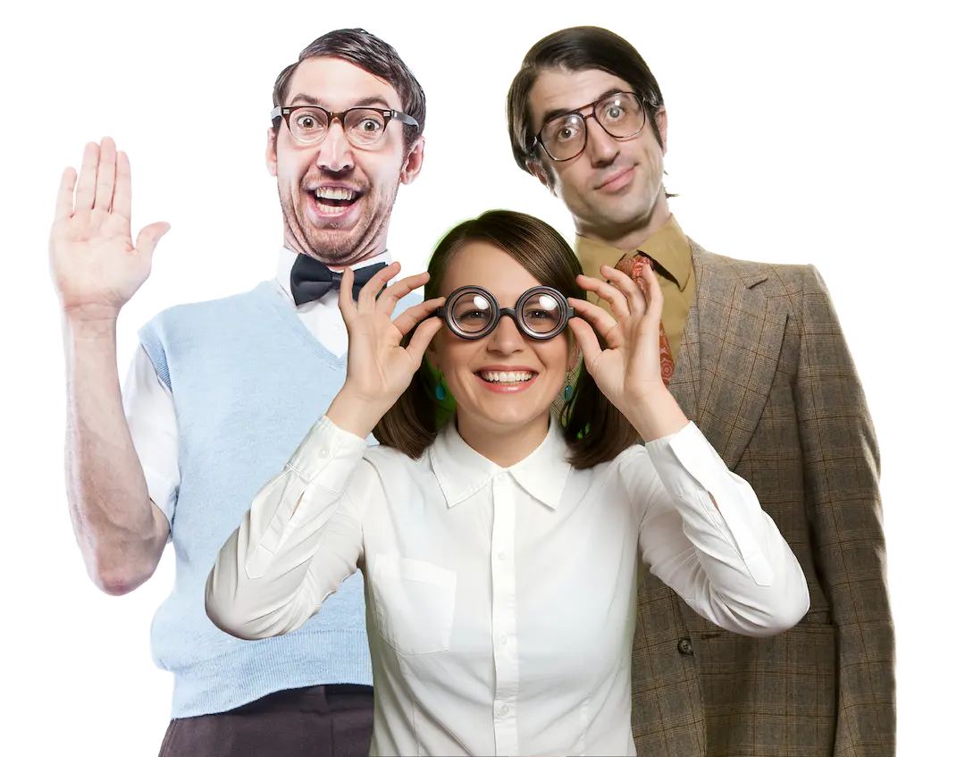 A candid headshot of a man with glasses holding a small pink flower