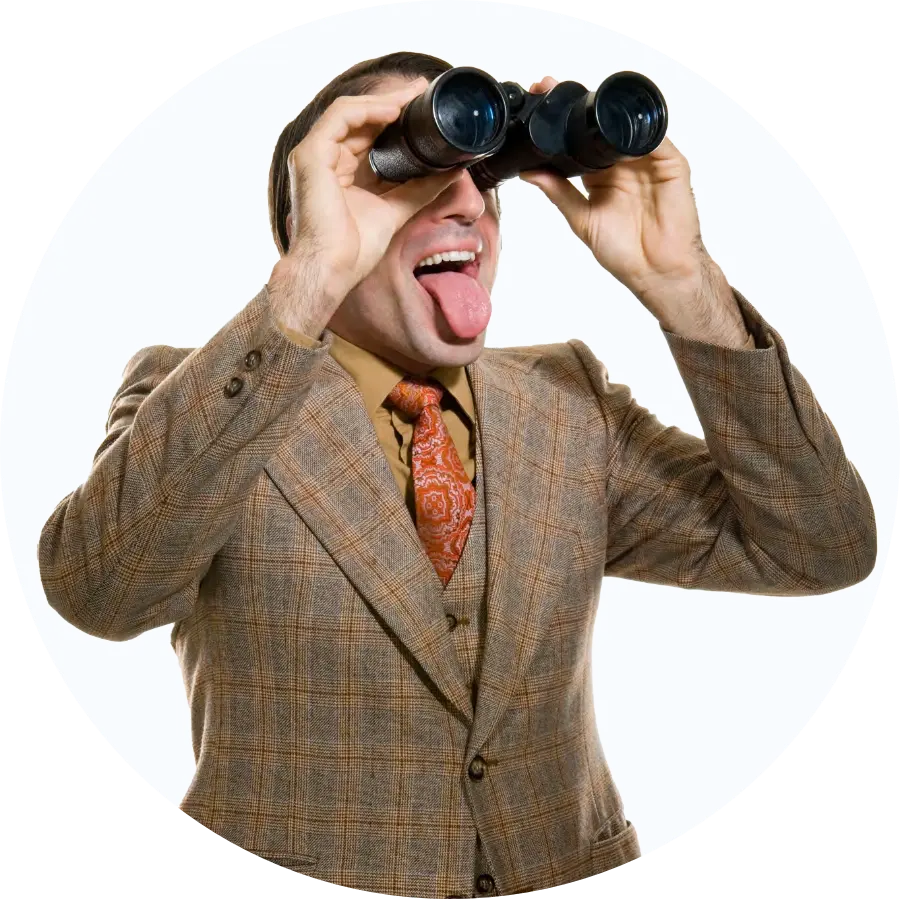 Man looking through binoculars